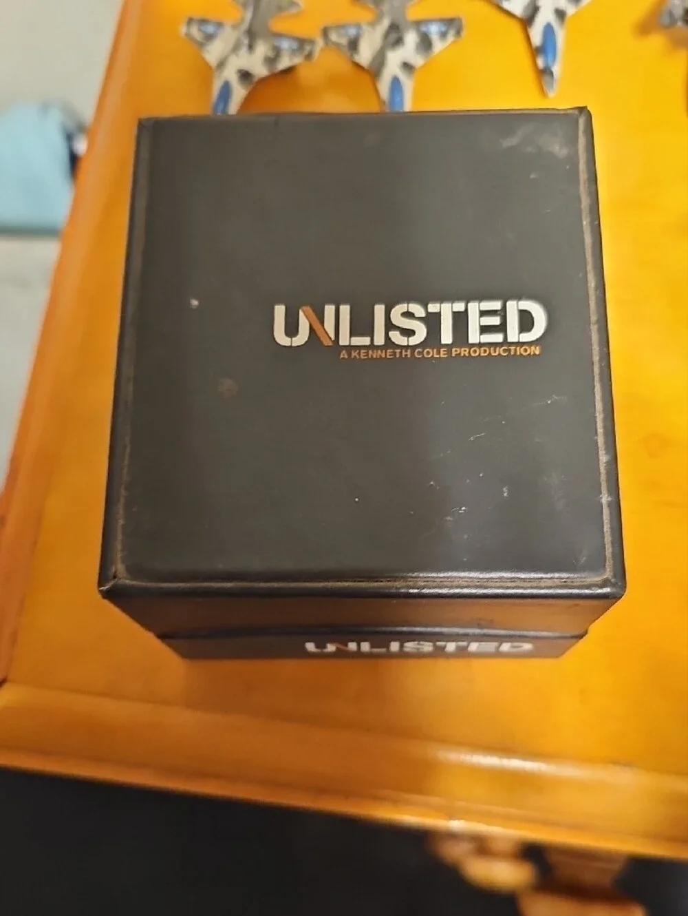 Unlisted by Kenneth Cole Silver Case Watch with Brown Leather Strap